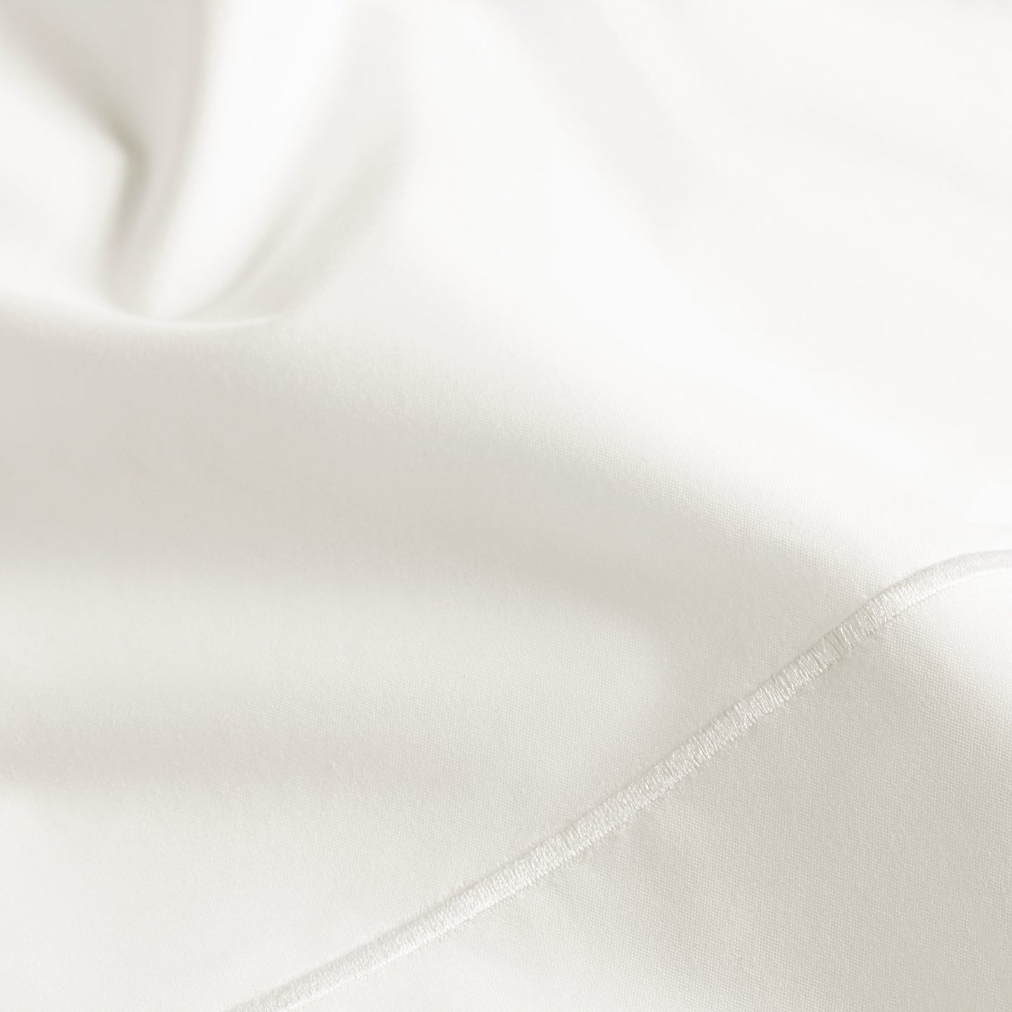 SlumberEmbroideredStripePercaleSheetSet_WhiteWhite_Home_StillLife_1x1_0098.jpg