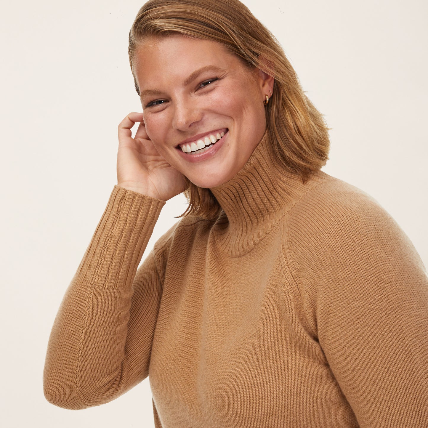 RelaxedCashmereTurtleneckSweater_Camel_Womens_OnFigure_1x1_1016.jpg