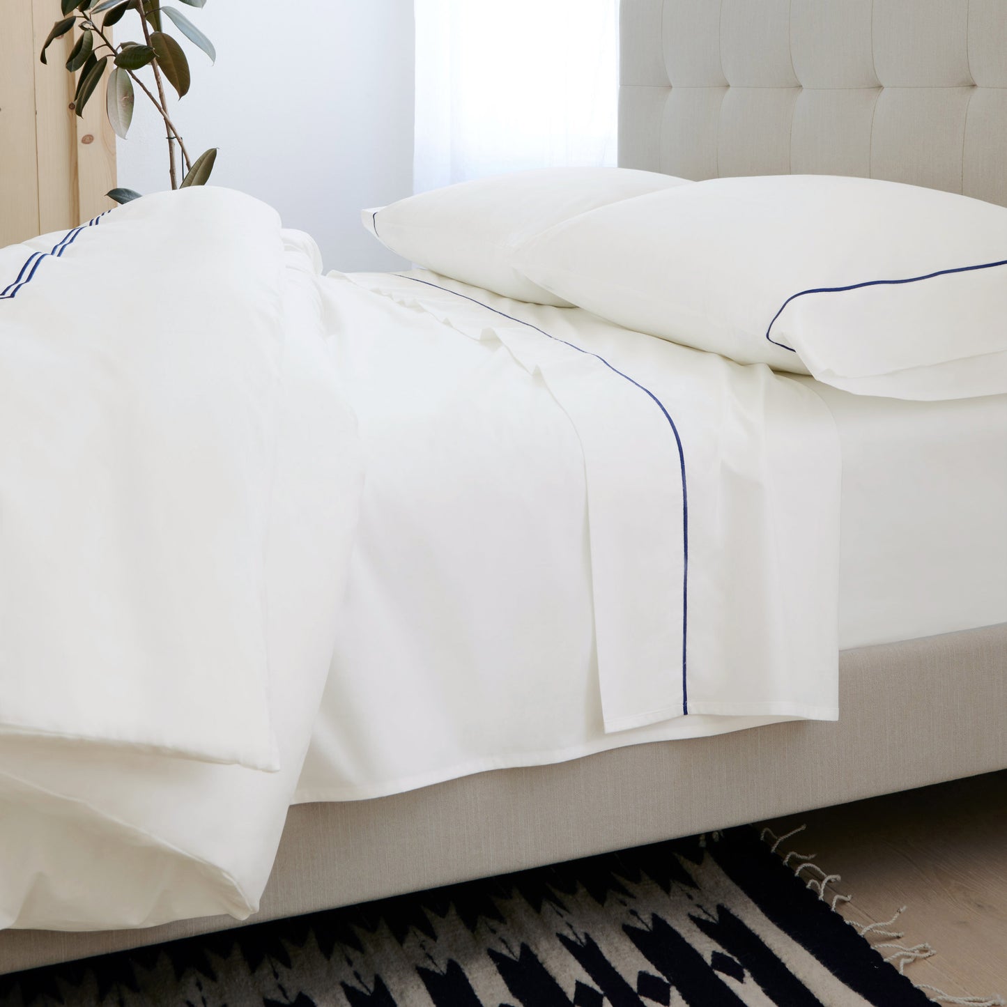 SlumberEmbroideredStripePercaleSheetSet_NavyWhite_Home_Lifestyle_3x4_Full.jpg