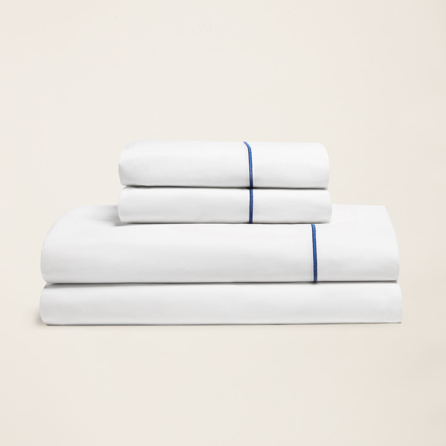 SlumberEmbroideredStripePercaleSheetSet_NavyWhite_Home_StillLife_1x1_0059.jpg